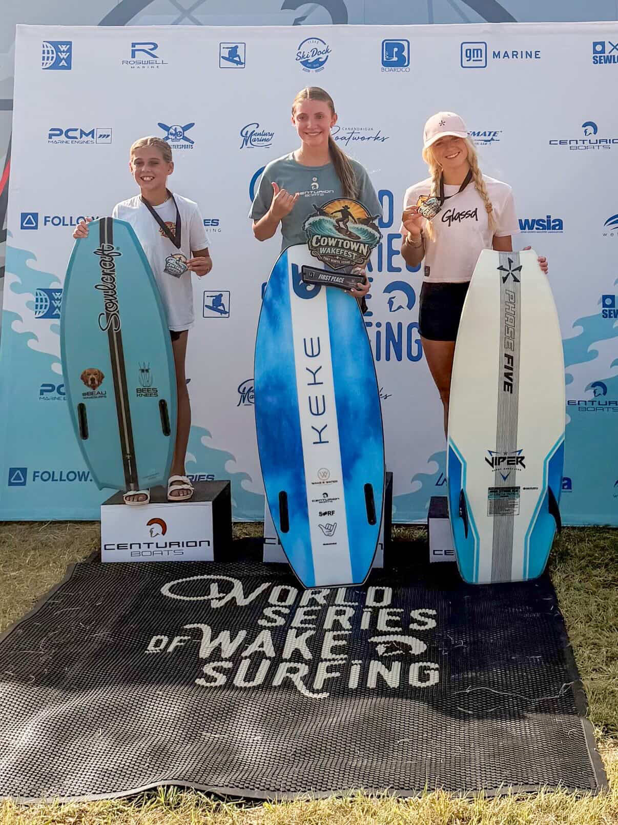 Glassd Daily Crop Tee in pink worn at a wakesurf competition podium
